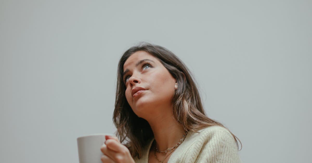 A girl holding a cup