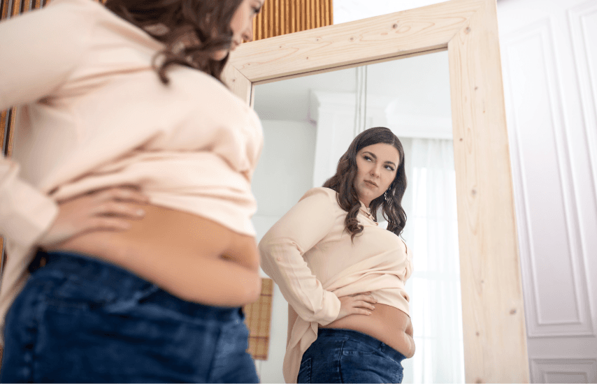 Rachel looks at mirror