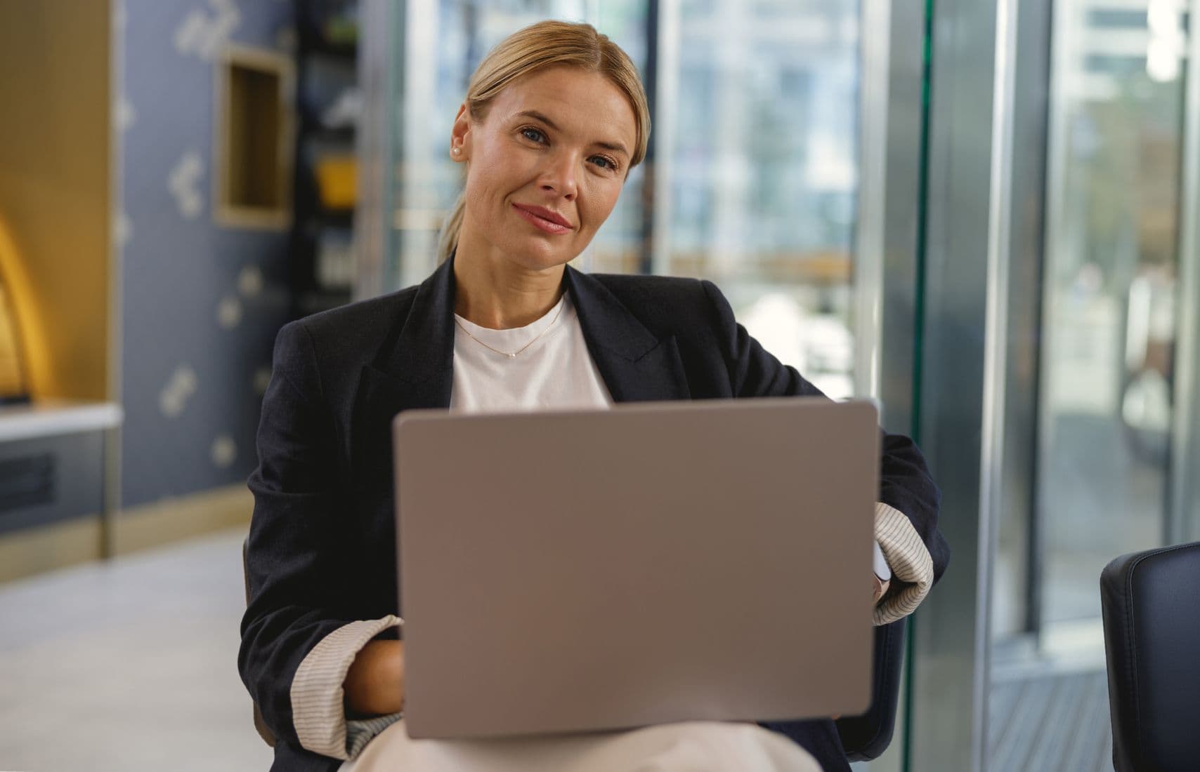 A woman with a laptop.